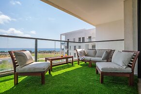 Vibrant Seaside Stay with Balcony by Sea N' Rent