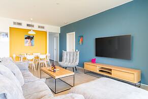 Vibrant Seaside Stay with Balcony by Sea N' Rent