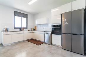 Vibrant Seaside Stay with Balcony by Sea N' Rent