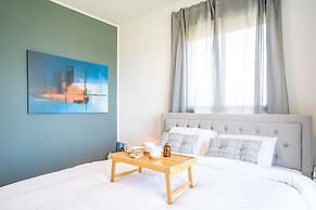 Vibrant Seaside Stay with Balcony by Sea N' Rent