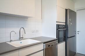 Vibrant Seaside Stay with Balcony by Sea N' Rent