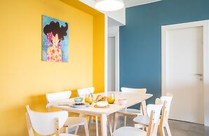 Vibrant Seaside Stay with Balcony by Sea N' Rent