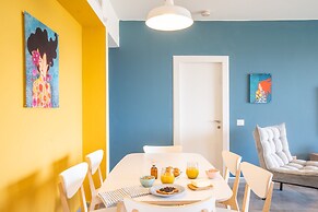 Vibrant Seaside Stay with Balcony by Sea N' Rent