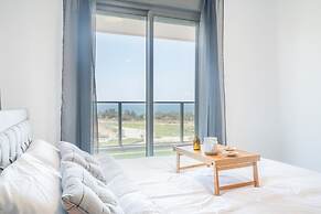 Vibrant Seaside Stay with Balcony by Sea N' Rent