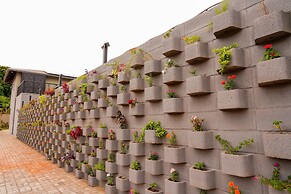 Pousada Flores do Carmo