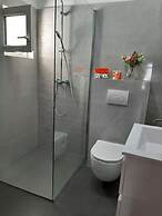 Spacious Apartment w. Balcony, big Garden & Grill