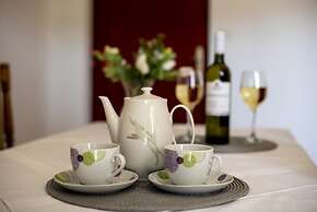 Spacious Apartment w. Balcony, big Garden & Grill