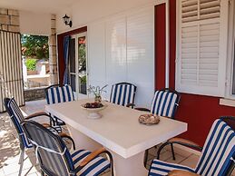 Beachfront Apartment With big Terrace and Garden