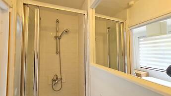 Grace Apartments - Living Stream 1