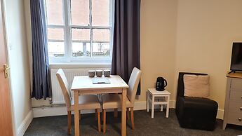 Grace Apartments - Living Rock