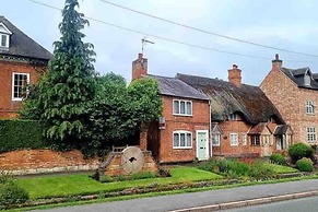 Village Period Cottage Next to a Idyllic Stream