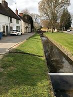 Village Period Cottage Next to a Idyllic Stream