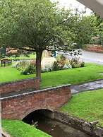 Village Period Cottage Next to a Idyllic Stream