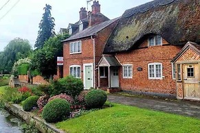 Village Period Cottage Next to a Idyllic Stream