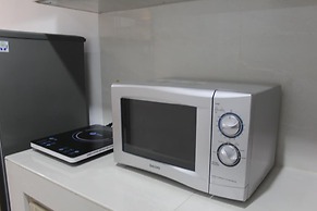 Bright Studio Apartment at Springwood Residence