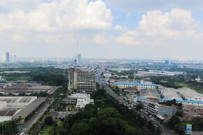 Bright Studio Apartment at Springwood Residence