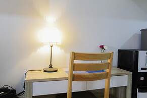 Bright Studio Apartment at Springwood Residence