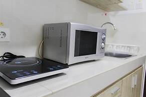 Bright Studio Apartment at Springwood Residence