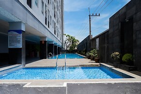 Trendy and Tidy Studio Room at Puri Mas Apartment