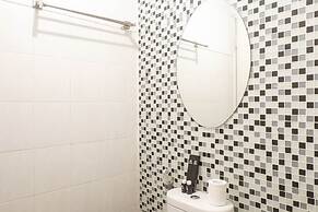 Trendy and Tidy Studio Room at Puri Mas Apartment