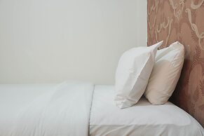 Cozy Stay at 2BR Green Pramuka Apartment near Shopping Center