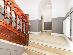 Council Chambers at The Institute Executive Apartments