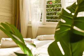 Serene Retreat with Lush Garden by Sea N Rent