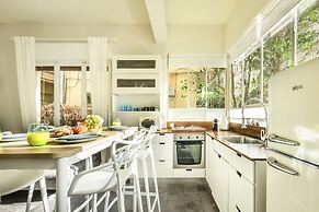 Serene Retreat with Lush Garden by Sea N Rent