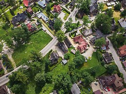 Zasypane House by Renters Prestige