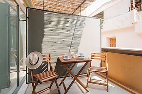 Thallos the Boutique