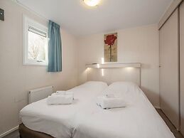 Comfy Chalet With Dishwasher, 500 m From the Beach