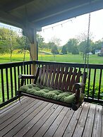 Yellow Cabin On The River 2 Bedroom Cabin by RedAwning