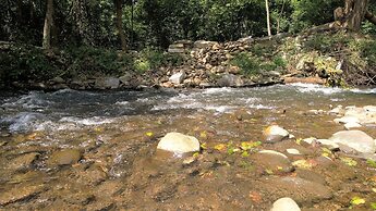 Yellow Cabin On The River 2 Bedroom Cabin by RedAwning