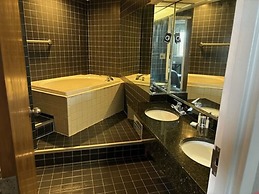 APM Inn and Suites