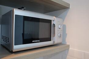 Fully Furnished With Comfy Design Studio Grand Kamala Lagoon Apartment