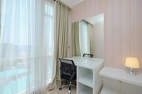 Homey And Comfy Studio Room At Menteng Park Apartment