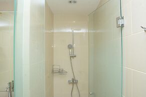 Homey And Cozy Stay 2Br At Casa Grande Apartment