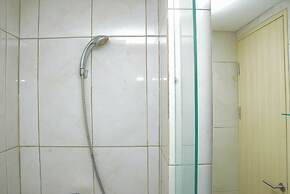 Comfort And Strategic Studio At The Nest Puri Apartment By Travelio