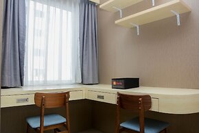 Comfort And Strategic Studio At The Nest Puri Apartment By Travelio