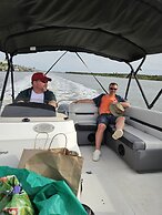 Peaceful Waterfront Pool Home 3 Bedroom Home by RedAwning