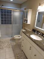 Peaceful Waterfront Pool Home 3 Bedroom Home by RedAwning