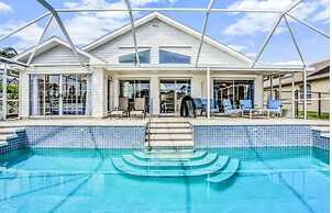 Peaceful Waterfront Pool Home 3 Bedroom Home by RedAwning