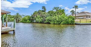 Peaceful Waterfront Pool Home 3 Bedroom Home by RedAwning