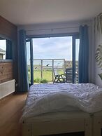 6 Pers Holiday Home Aurora With Directly on the Lauwersmeer