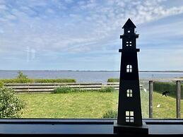6 Pers Holiday Home Aurora With Directly on the Lauwersmeer