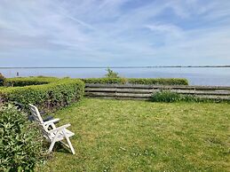 6 Pers Holiday Home Aurora With Directly on the Lauwersmeer