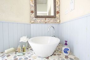 Tiny Home Retreat Near Beach- Marsh Mellow Cottage by BSL Rentals