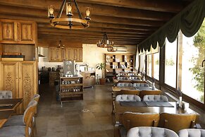 Ada Cave Suites Hotel