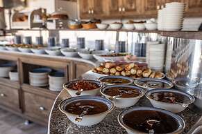 Ada Cave Suites Hotel