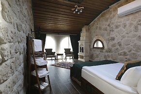 Ada Cave Suites Hotel